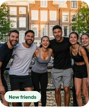 A group of runners laughing together